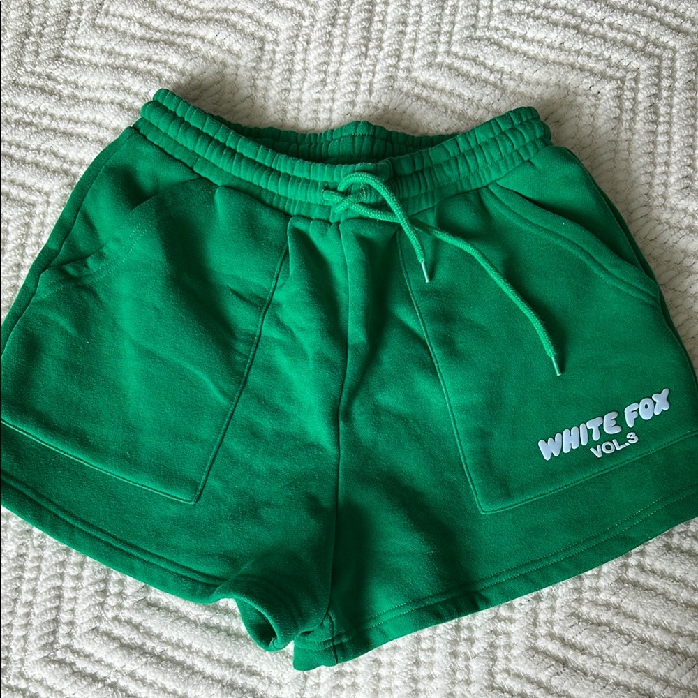 White Fox Boutique Green Sweat Shorts with Blue Lettering